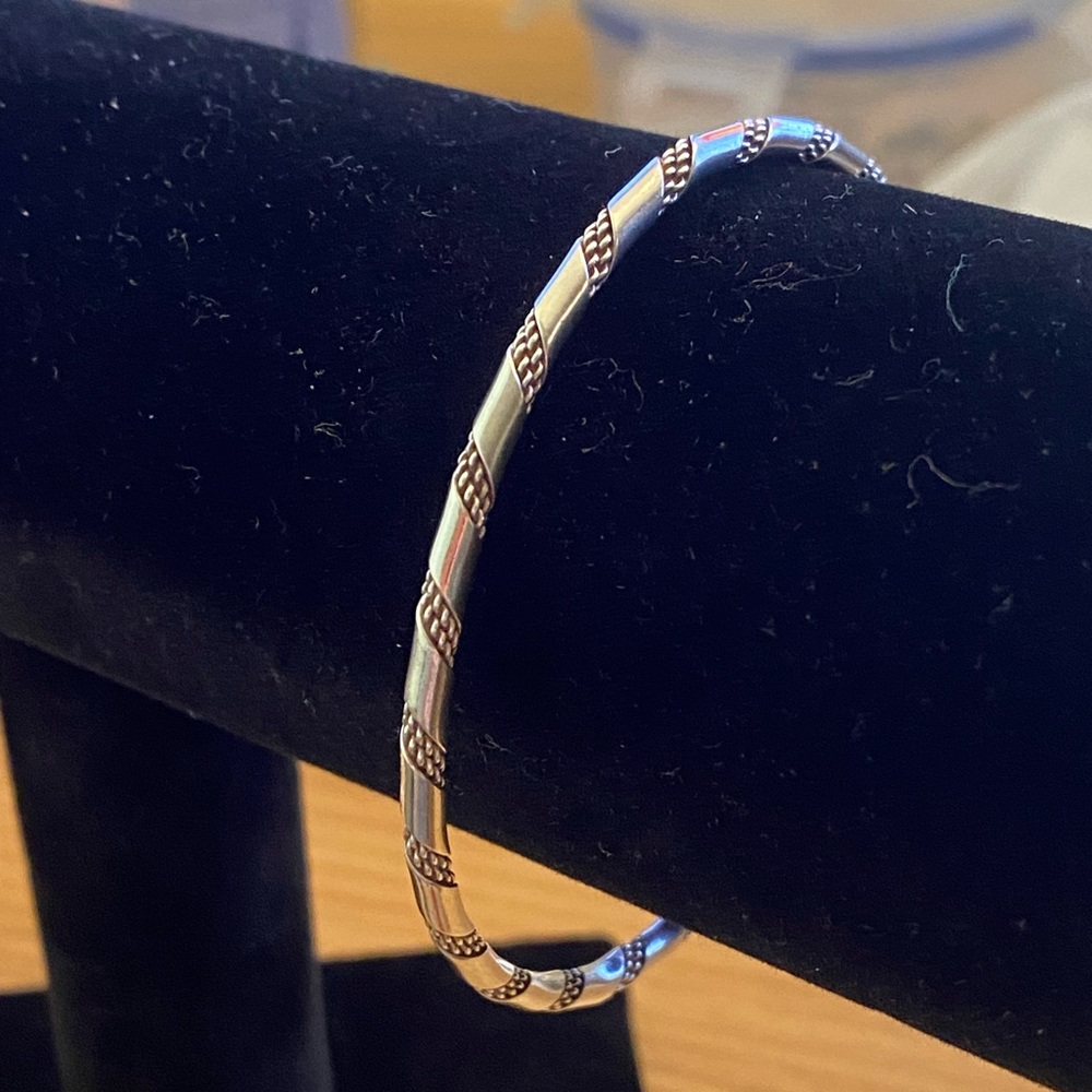 Gorgeous, silver braided twist cuff bracelet